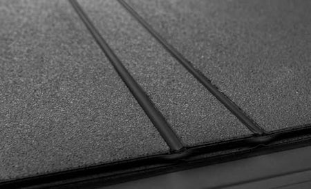 ACI ACI Lomax Folding 15-20 Ford F-150 5.6' Box Hard Tonneau Cover Black Urethane - Outdoor-Depot.us